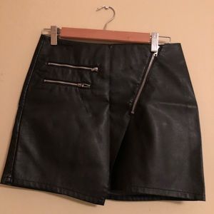 Black faux leather skirt in excellent condition
